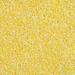 Corn Grits In A Glass Bowl With A Wooden Spoon, A Cob Of Boiled