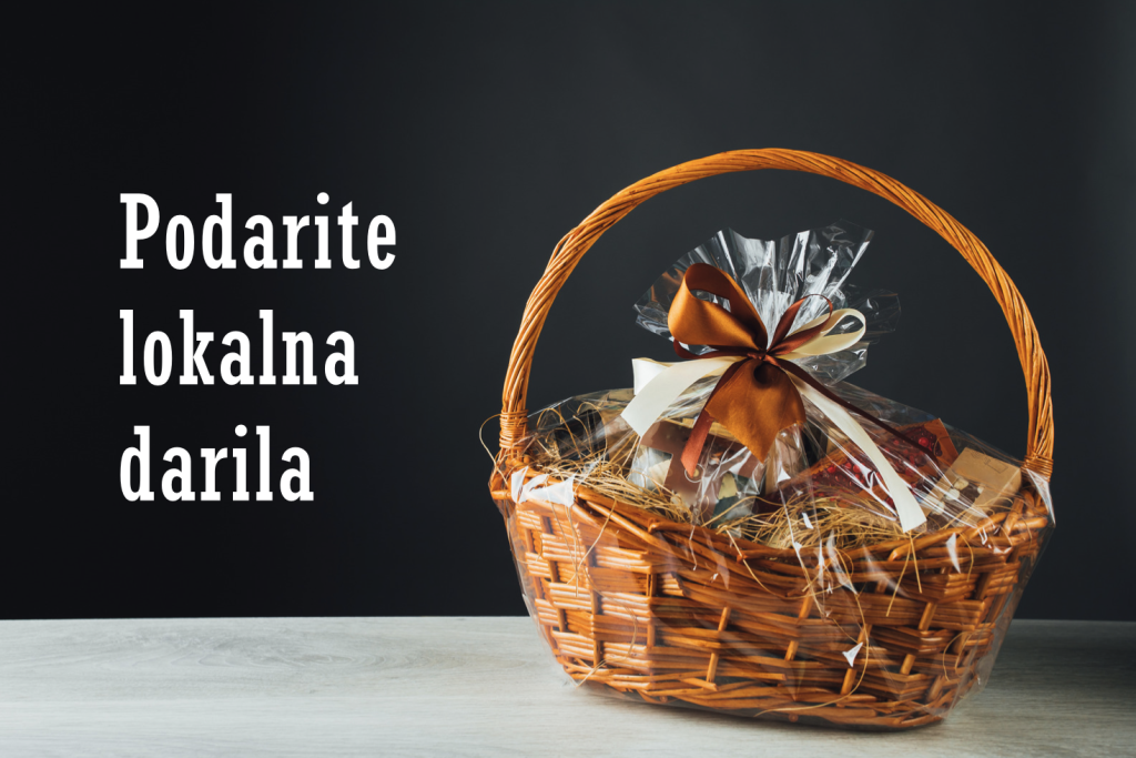 Košarica slovenskih dobrot kot darilo in zraven napis: podarite lokalna darila